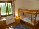 French windows from the lounge lead to the terrace and large garden