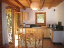 The kitchen is fully equipped with another balcony leading off