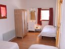 The triple bedroom incorporates a wash basin