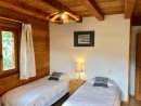 Bedroom 3 has 2 single beds and adequate space for a travel bed